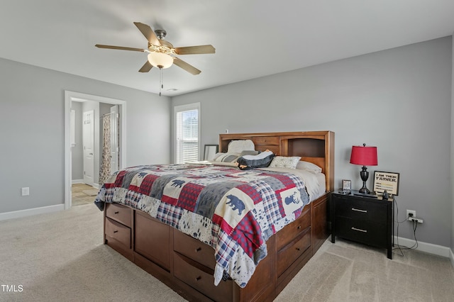 105 Langdon Chase Way, Selma, NC 27576 - bedroom featuring light carpet, baseboards, ensuite bathroom, and ceiling fan