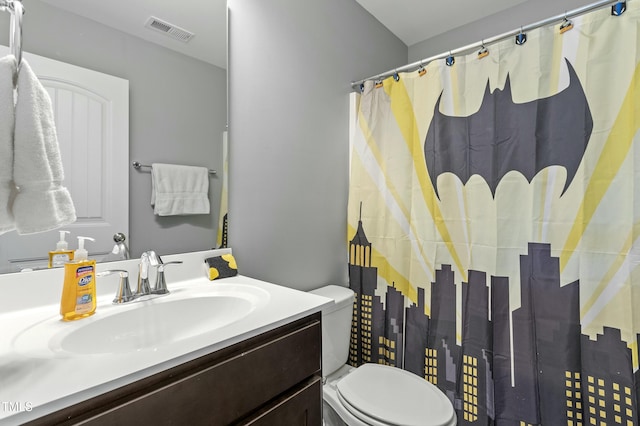 105 Langdon Chase Way, Selma, NC 27576 - bathroom featuring visible vents, toilet, vanity, and a shower with shower curtain
