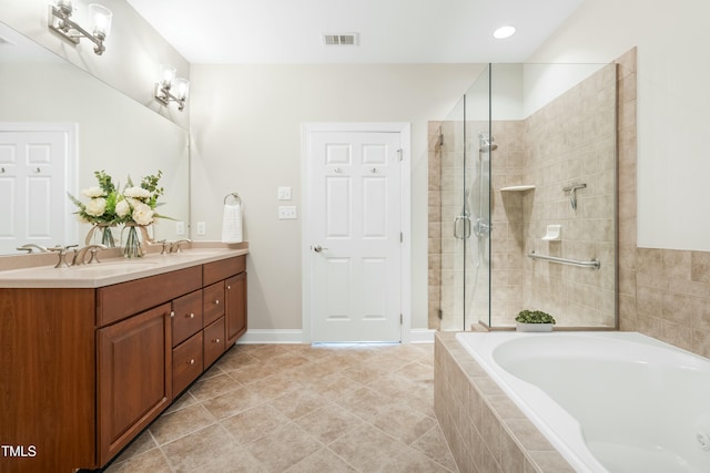 bathroom featuring vanity, separate shower and tub, and tile patterned flooring