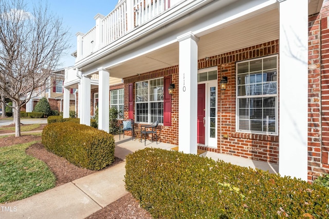 doorway to property with a porch