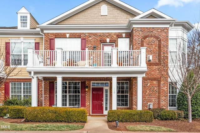 view of front of home with a balcony