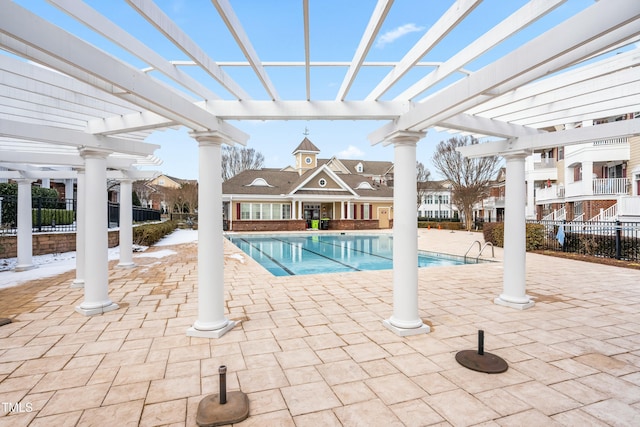 view of swimming pool with a pergola and a patio area