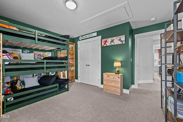 carpeted bedroom with a closet