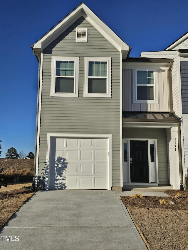 view of front of home with a garage