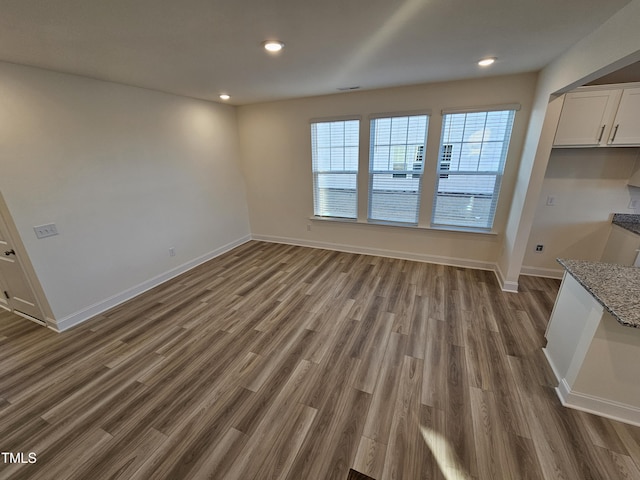 interior space with dark hardwood / wood-style flooring