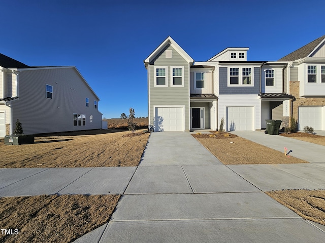 view of front of property featuring a garage