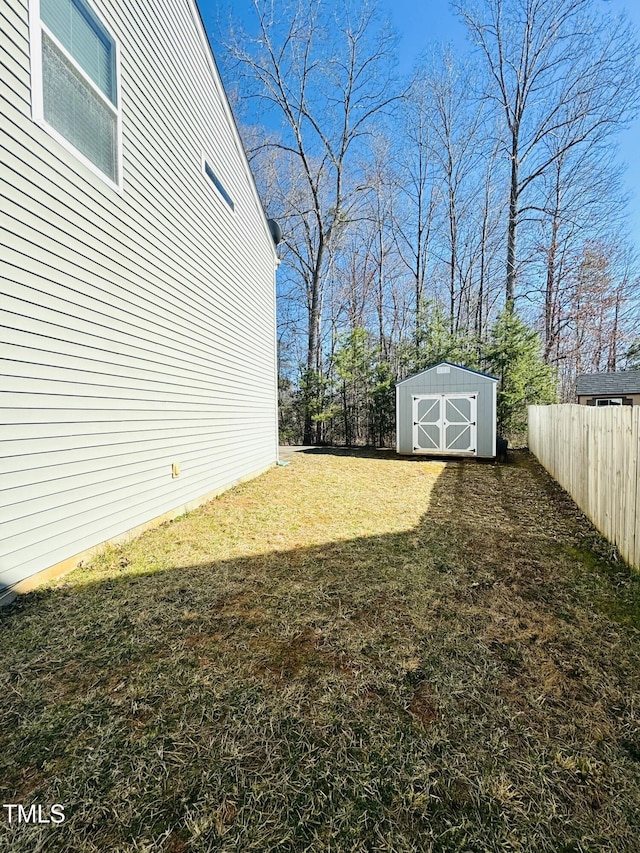 5879 Odenton Ln, Pfafftown, NC 27040 - view of yard with a shed and an outbuilding