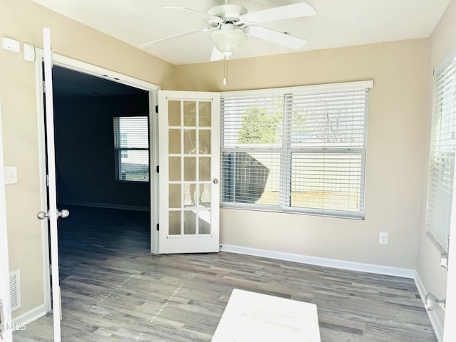 5879 Odenton Ln, Pfafftown, NC 27040 - unfurnished room with a ceiling fan, wood finished floors, baseboards, and french doors