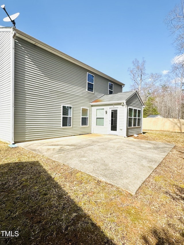 5879 Odenton Ln, Pfafftown, NC 27040 - rear view of property with a patio and fence