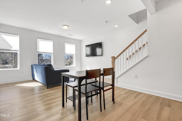 dining room featuring light hardwood / wood-style flooring