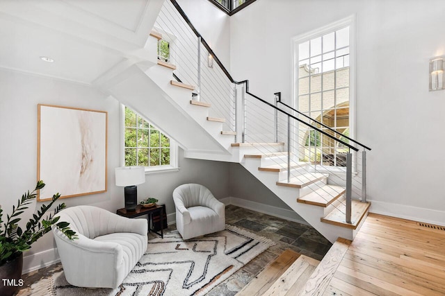 staircase featuring hardwood / wood-style floors