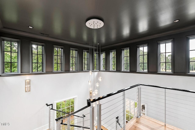 stairway featuring wood-type flooring