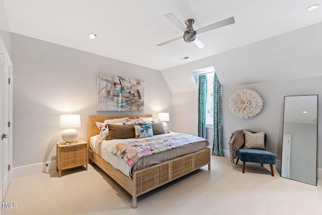 carpeted bedroom featuring ceiling fan and lofted ceiling