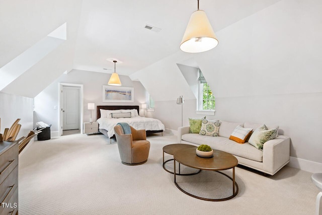 carpeted bedroom featuring lofted ceiling