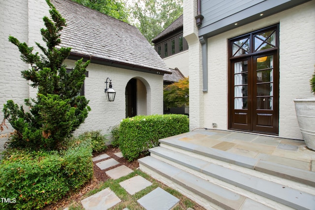 entrance to property featuring french doors