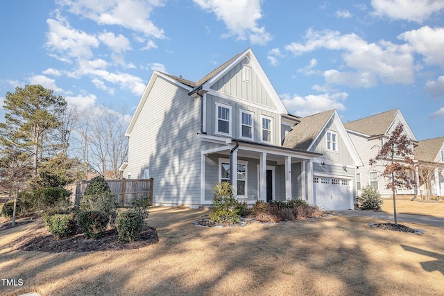 view of front of house with a garage and a porch