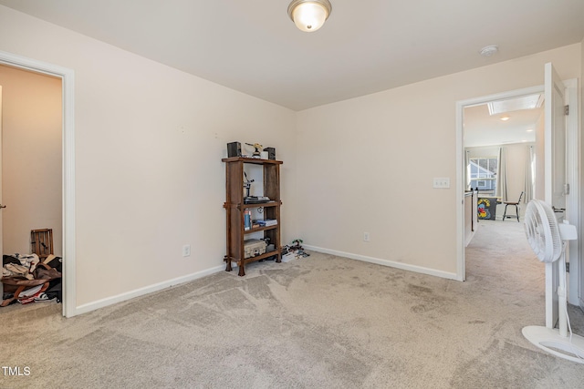 spare room with light colored carpet