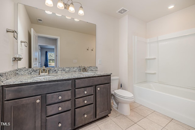 full bathroom with shower / tub combination, tile patterned floors, toilet, and vanity