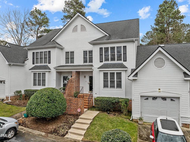 front facade with a garage