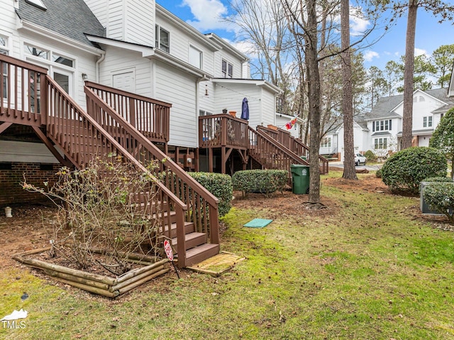 view of yard with a wooden deck