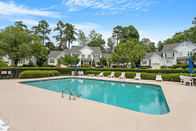 view of swimming pool featuring a patio