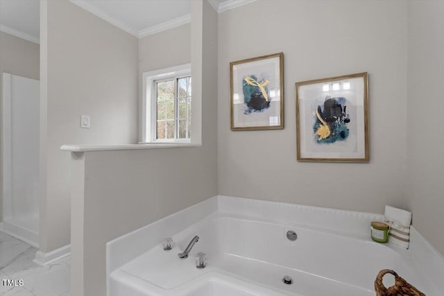 bathroom featuring crown molding and a bathtub