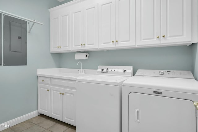 clothes washing area with light tile patterned floors, sink, electric panel, cabinets, and washing machine and dryer