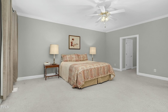 bedroom with ornamental molding, light colored carpet, and ceiling fan