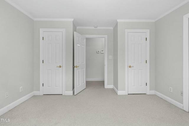 unfurnished bedroom featuring crown molding and light carpet