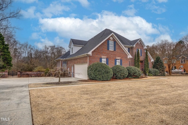 view of home's exterior with a garage and a yard