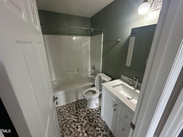 216 Parrish Farm Ln, Benson, NC 27504 - full bath with vanity, toilet, a textured ceiling, and bathtub / shower combination