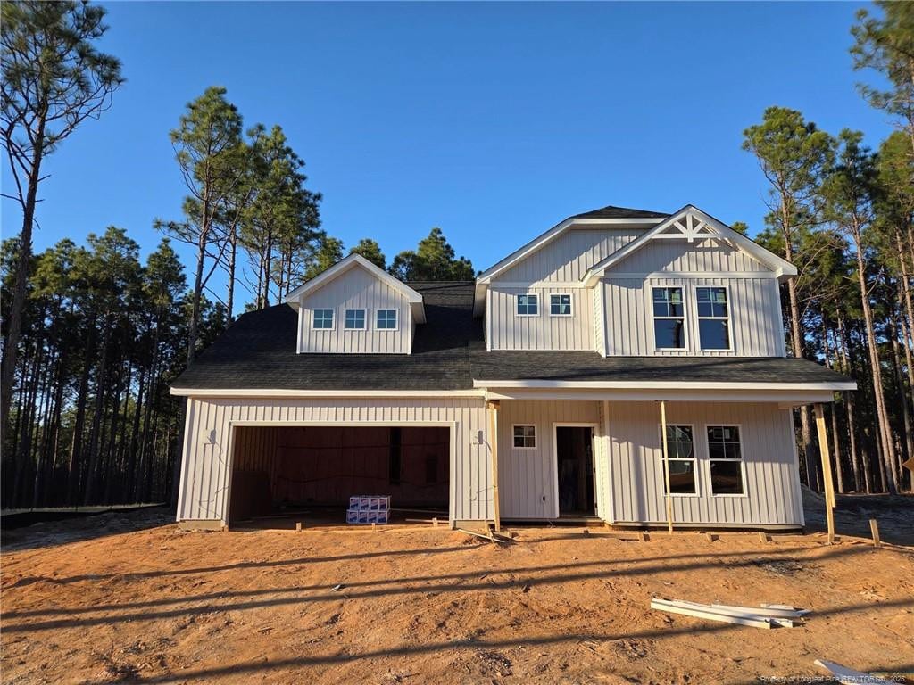 view of front of home with a garage and board and batten siding