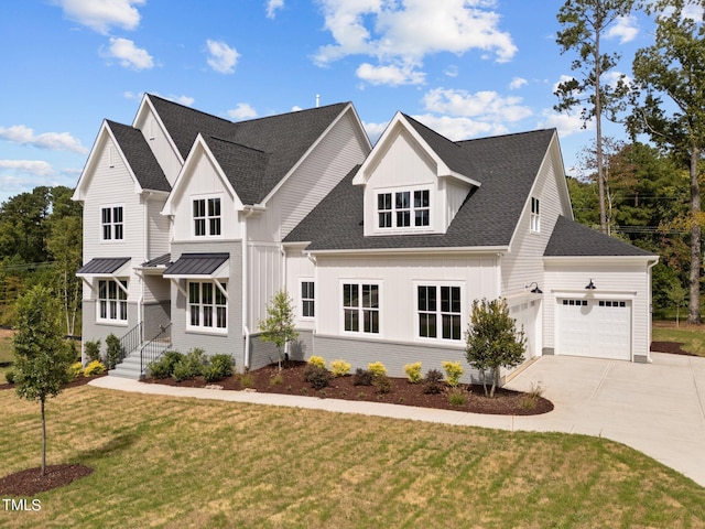 view of front facade featuring a garage and a front yard