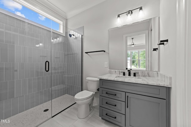 bathroom featuring crown molding, vanity, toilet, and an enclosed shower