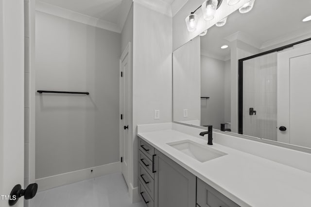 bathroom with vanity, crown molding, tile patterned floors, and walk in shower