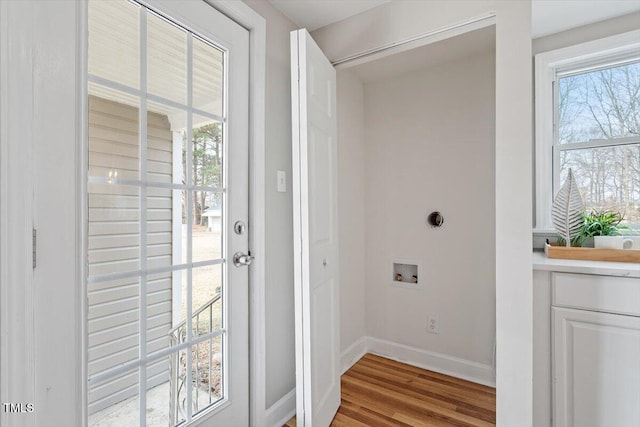 doorway to outside featuring light hardwood / wood-style flooring