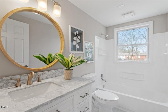 full bathroom featuring vanity, shower / bathing tub combination, and toilet