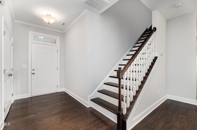 entryway with crown molding and dark hardwood / wood-style flooring