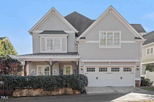 view of front of property featuring a garage