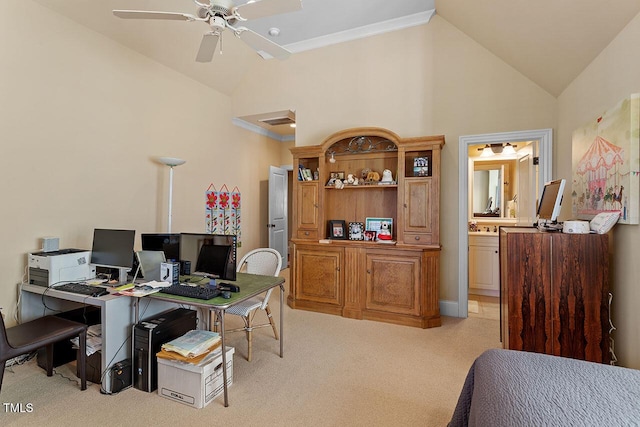 office space featuring high vaulted ceiling, light colored carpet, and ceiling fan