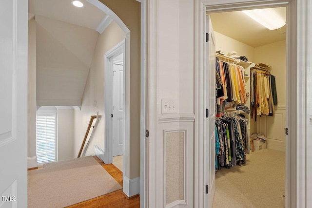 hallway with light carpet