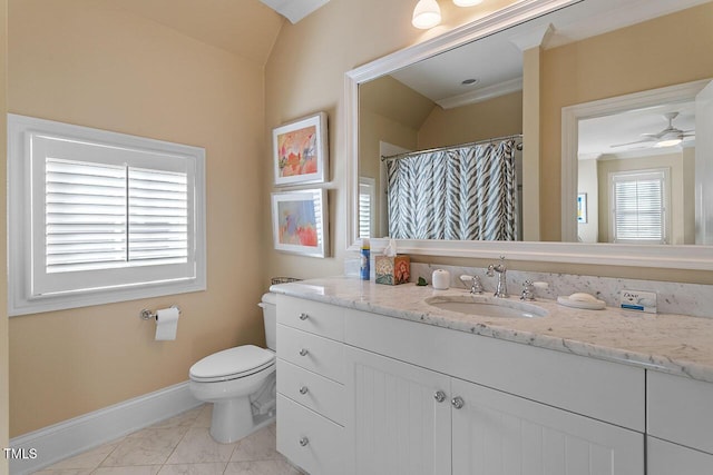 bathroom featuring vanity, ceiling fan, and toilet