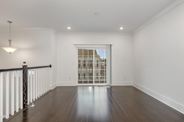 unfurnished room with crown molding and dark wood-type flooring