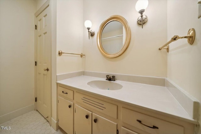 bathroom with vanity and tile patterned floors