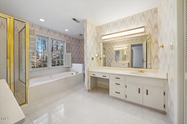 bathroom featuring tile patterned floors, vanity, and independent shower and bath