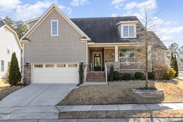 craftsman-style home with a garage and covered porch