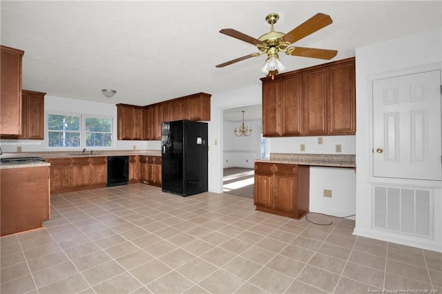 kitchen featuring sink, ceiling fan with notable chandelier, and black appliances