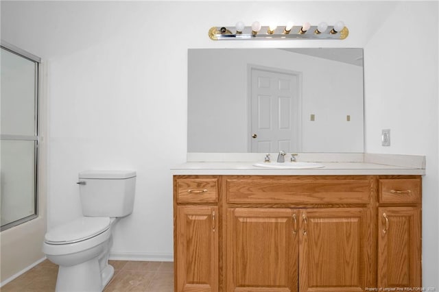 full bathroom with tile patterned floors, vanity, toilet, and combined bath / shower with glass door