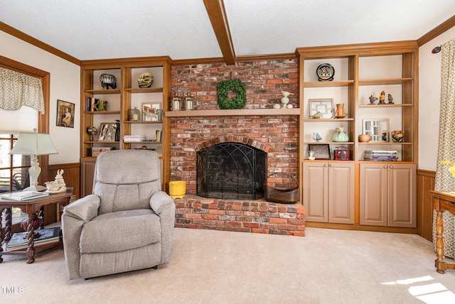 carpeted living room with crown molding, beam ceiling, a fireplace, and a textured ceiling