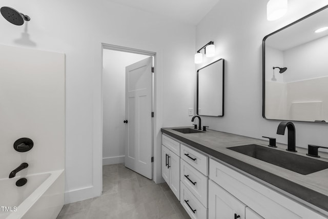 bathroom with vanity and tub / shower combination